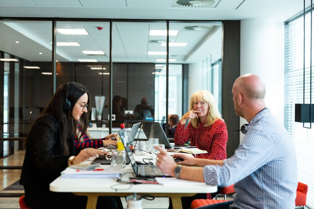 Our advisers at our communal hot desk